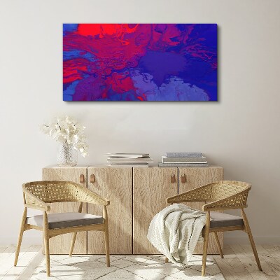 Leinwandbild Eine Welle von Farben in Lila und Blau