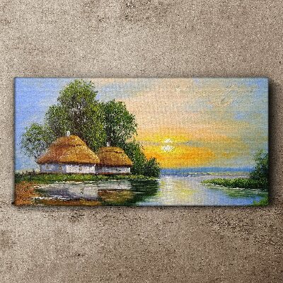 Foto auf leinwand Ein friedlicher Sonnenuntergang über dem Dorf