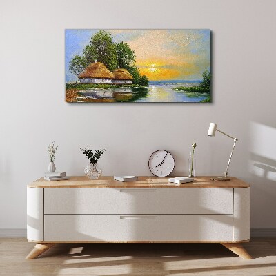 Foto auf leinwand Ein friedlicher Sonnenuntergang über dem Dorf