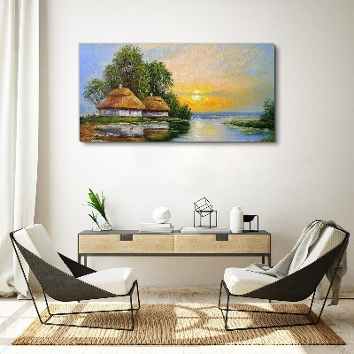 Foto auf leinwand Ein friedlicher Sonnenuntergang über dem Dorf