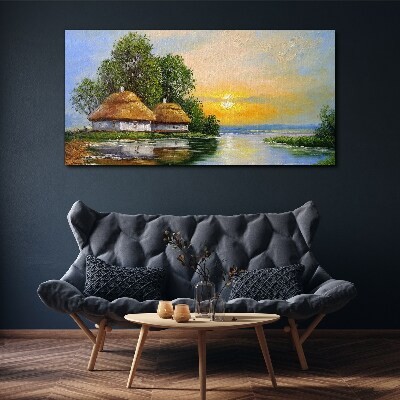 Foto auf leinwand Ein friedlicher Sonnenuntergang über dem Dorf