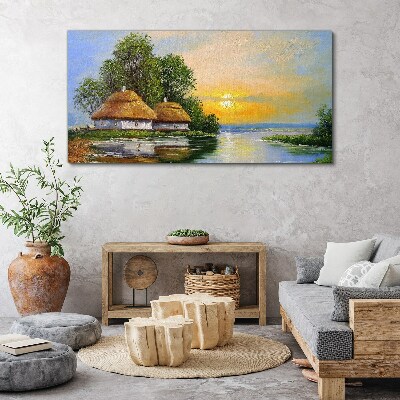 Foto auf leinwand Ein friedlicher Sonnenuntergang über dem Dorf
