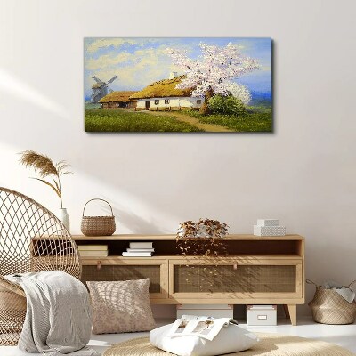 Foto auf leinwand Ländliche Landschaft mit einer Windmühle und Blumen
