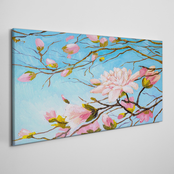 Foto auf leinwand Magnolienblüten auf blauem Hintergrund