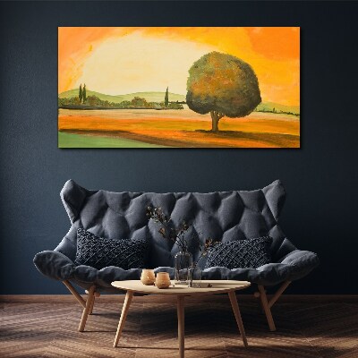 Bild auf leinwand Goldene Lichtung mit einem Baum