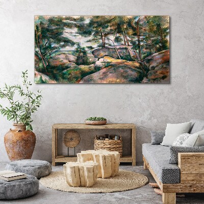 Foto auf leinwand Eine steinige Landschaft zwischen Bäumen