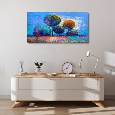 Foto auf leinwand Bunte Bäume auf blauem Hintergrund