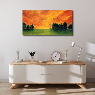 Foto auf leinwand Sonnenuntergang über dem grünen Hügel