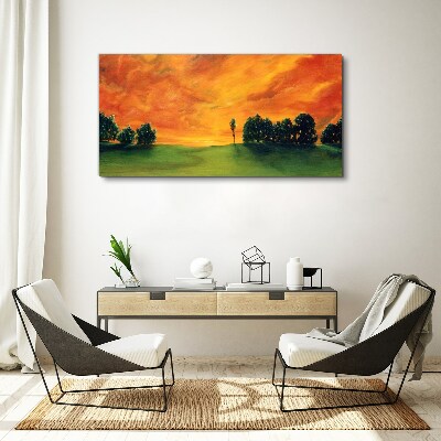 Foto auf leinwand Sonnenuntergang über dem grünen Hügel