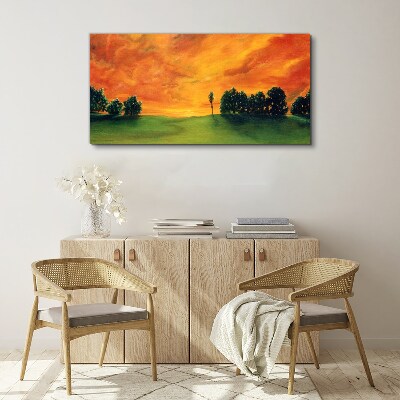 Foto auf leinwand Sonnenuntergang über dem grünen Hügel
