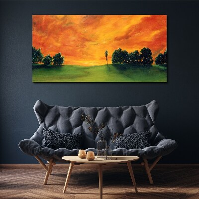 Foto auf leinwand Sonnenuntergang über dem grünen Hügel