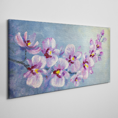Foto auf leinwand Blumenorchideen auf blauem Hintergrund