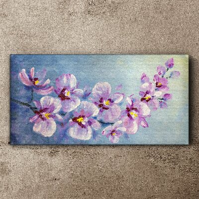 Foto auf leinwand Blumenorchideen auf blauem Hintergrund