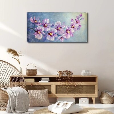 Foto auf leinwand Blumenorchideen auf blauem Hintergrund