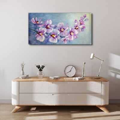 Foto auf leinwand Blumenorchideen auf blauem Hintergrund