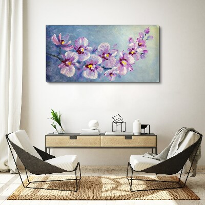 Foto auf leinwand Blumenorchideen auf blauem Hintergrund