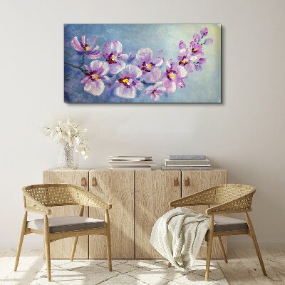 Foto auf leinwand Blumenorchideen auf blauem Hintergrund