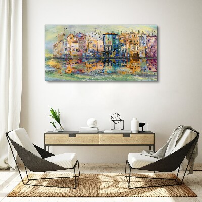 Foto auf leinwand Eine bunte Stadt am Wasser