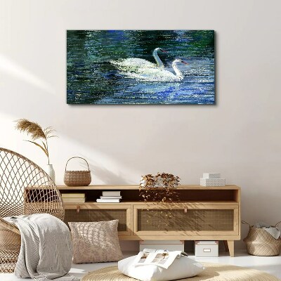 Foto auf leinwand Ruhiges Wasser mit Schwänen