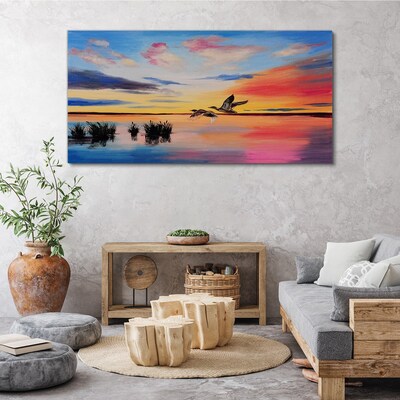 Foto auf leinwand Sonnenuntergang über dem See