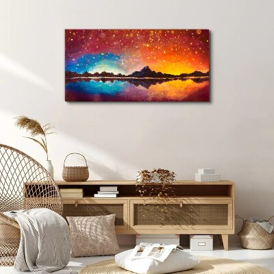 Wandbild Sonnenuntergang über einem Bergsee