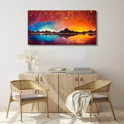 Wandbild Sonnenuntergang über einem Bergsee