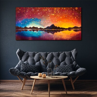 Wandbild Sonnenuntergang über einem Bergsee