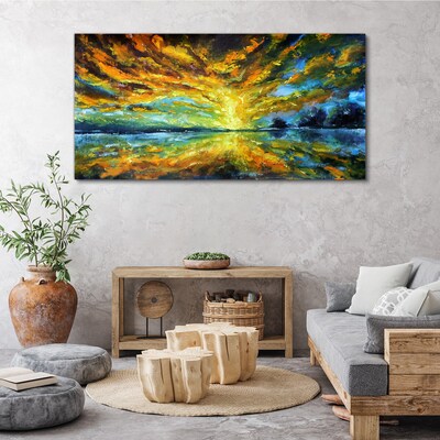 Foto auf leinwand Goldene Wolken über ruhigem Wasser