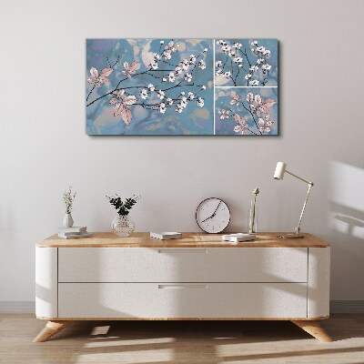 Bild auf leinwand Blumenzweige auf blauem Hintergrund