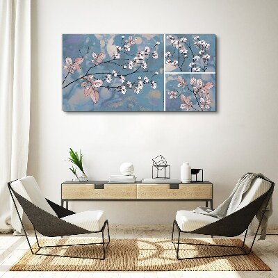 Bild auf leinwand Blumenzweige auf blauem Hintergrund