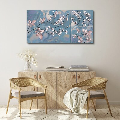 Bild auf leinwand Blumenzweige auf blauem Hintergrund