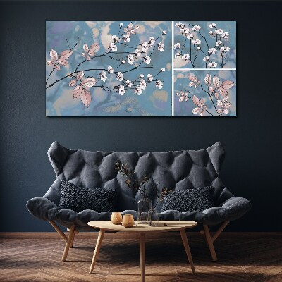 Bild auf leinwand Blumenzweige auf blauem Hintergrund