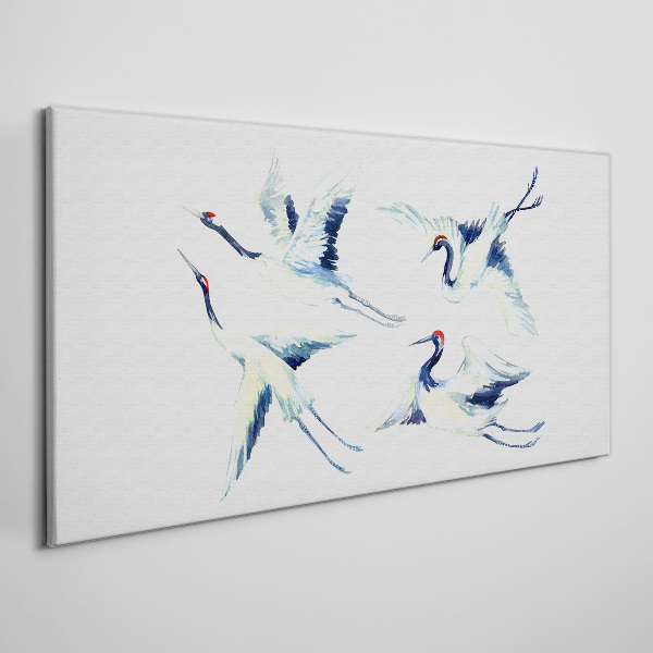 Foto auf leinwand Tanzende Kraniche im Blau
