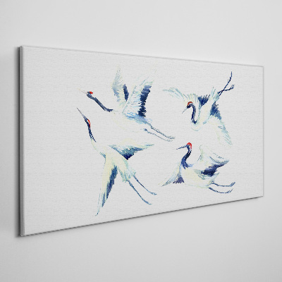 Foto auf leinwand Tanzende Kraniche im Blau