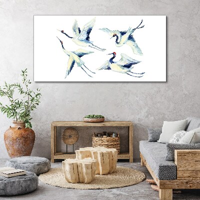 Foto auf leinwand Tanzende Kraniche im Blau