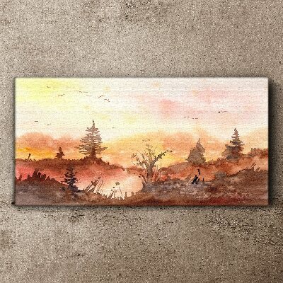 Foto auf leinwand Sonnenuntergang über einer Waldlandschaft