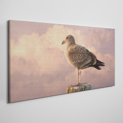 Foto auf leinwand Geflügelter Wächter in den Wolken