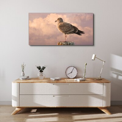 Foto auf leinwand Geflügelter Wächter in den Wolken