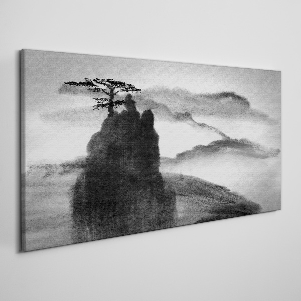 Foto auf leinwand Ein einsamer Baum auf einem felsigen Berg