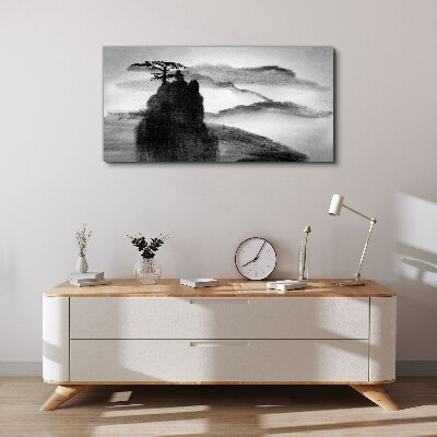 Foto auf leinwand Ein einsamer Baum auf einem felsigen Berg
