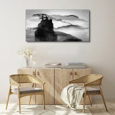 Foto auf leinwand Ein einsamer Baum auf einem felsigen Berg
