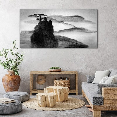 Foto auf leinwand Ein einsamer Baum auf einem felsigen Berg