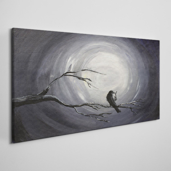 Leinwandbild Ein einsamer Vogel auf einem Ast
