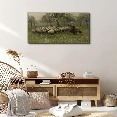 Foto auf leinwand Schafe grasen in einer mystischen Landschaft
