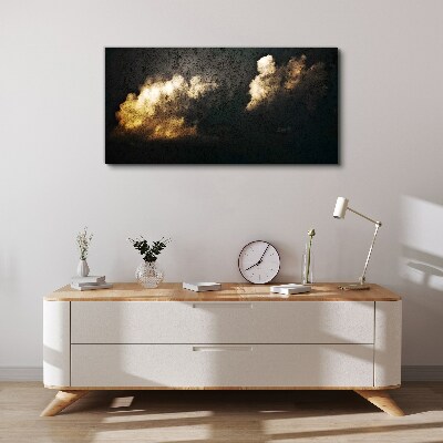 Foto auf leinwand Goldene Wolken auf dunklem Hintergrund