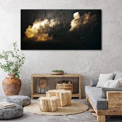 Foto auf leinwand Goldene Wolken auf dunklem Hintergrund