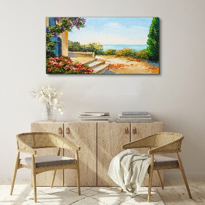 Foto auf leinwand Küstenlandschaft mit Blumen