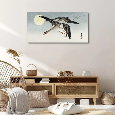Bild auf leinwand Gänse im Flug unter dem Vollmond