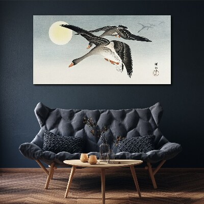 Bild auf leinwand Gänse im Flug unter dem Vollmond