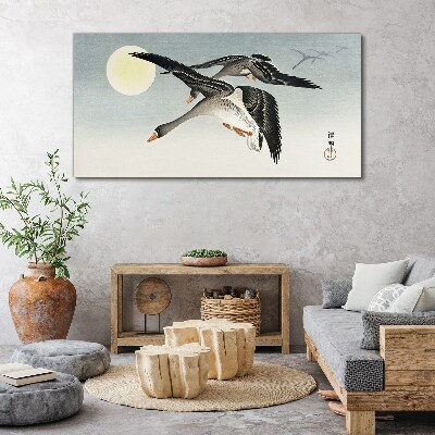 Bild auf leinwand Gänse im Flug unter dem Vollmond
